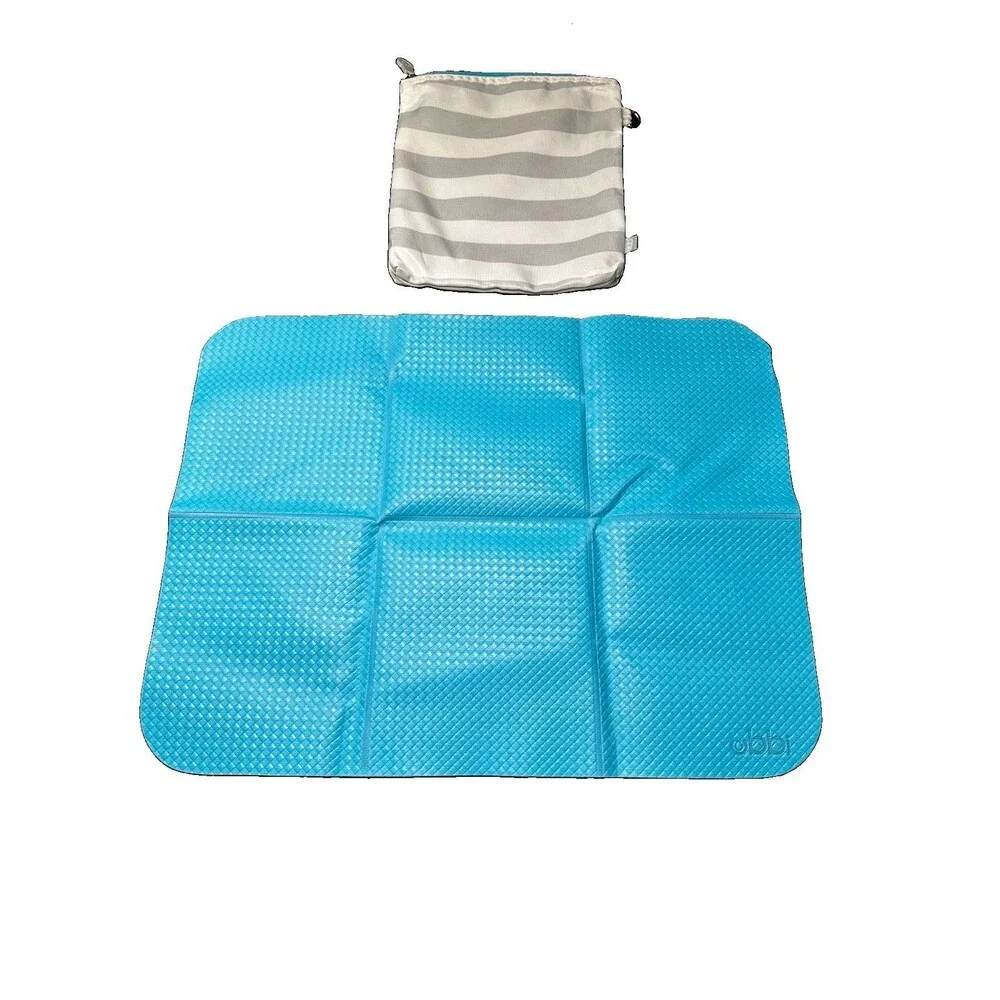Ubbi On-The-Go Baby Diaper Changing Mat, Portable Foldable Travel Pad